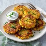 served Crispy Cheddar Corn Potato Fritters with sour cream